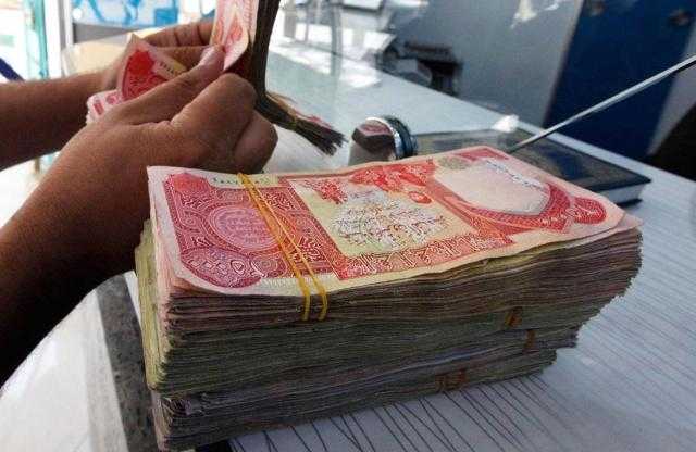 وزارة المالية العراقية: خفض قيمة الدينار ضمن حزمة من الإصلاحات