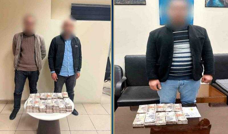 ضبط 3 أشخاص أثناء تهريب مبالغ مالية بمطار القاهرة